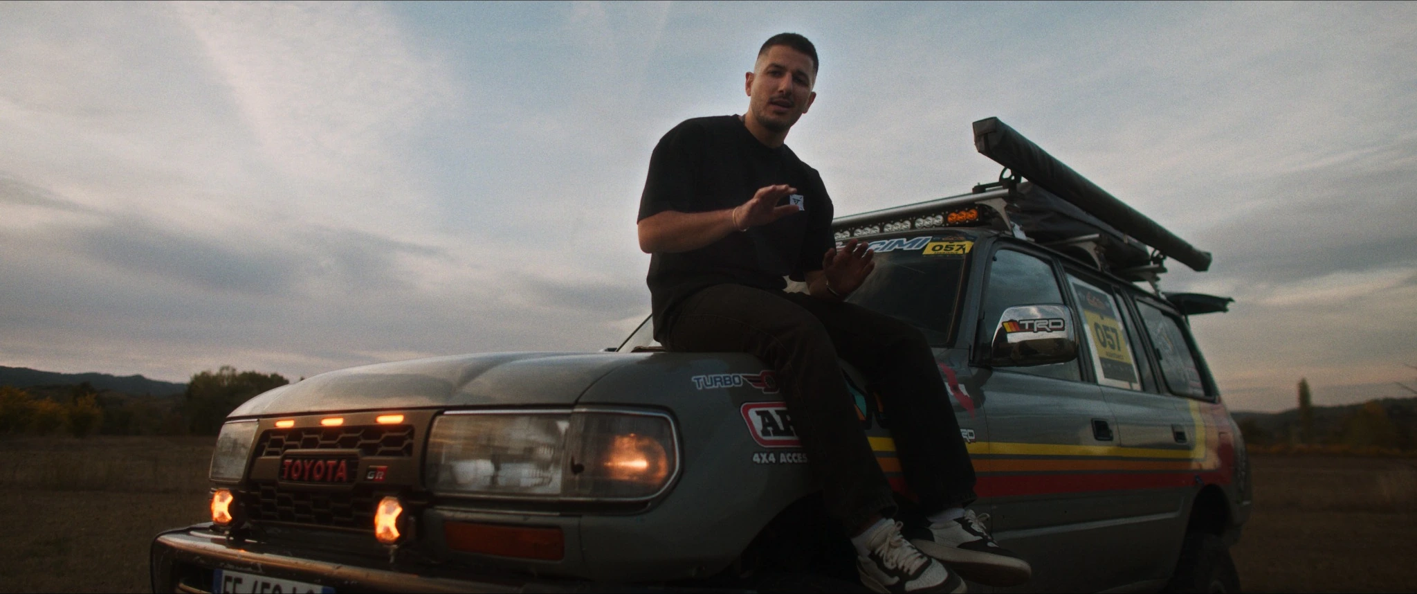 A man seated on an off-road vehicle in Illyrius Motorsport